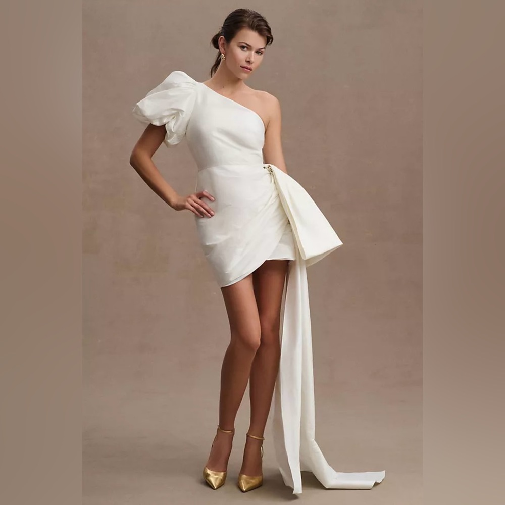 Sachin & Babi | Dova ​/​ Dorien Puffed One Shoulder Bow Train Mini Wrap Dress